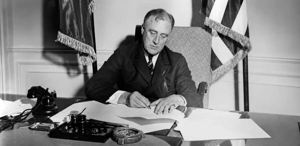 President Franklin D. Roosevelt signs Executive Order 6102 gold confiscation order 1933